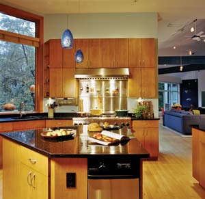 The kitchen has FSC-certified maple and wheatboard cabinets, and its counters are made of soapstone, a beautiful, stain-resistant surface that retains heat.